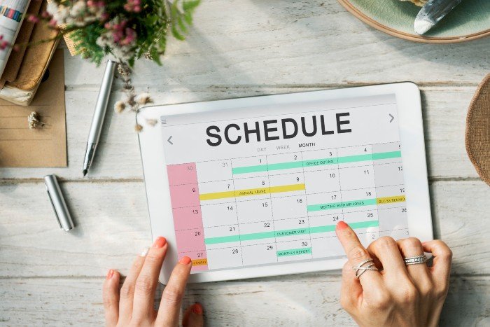a desktop calendar with the word 'schedule'