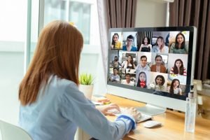 girl is video-conferencing with colleagues